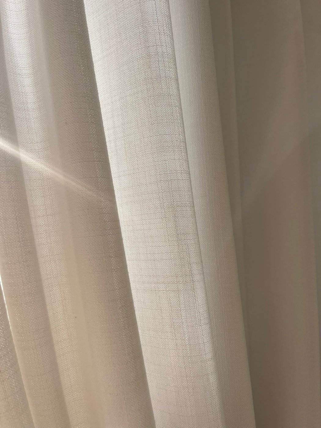 Soft natural light through the curtains at 12:47 Beauty